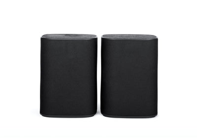 milan satellite speakers standing side by side over white background